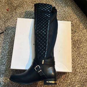 Women’s new in box below knee black and gold boots size 7.5